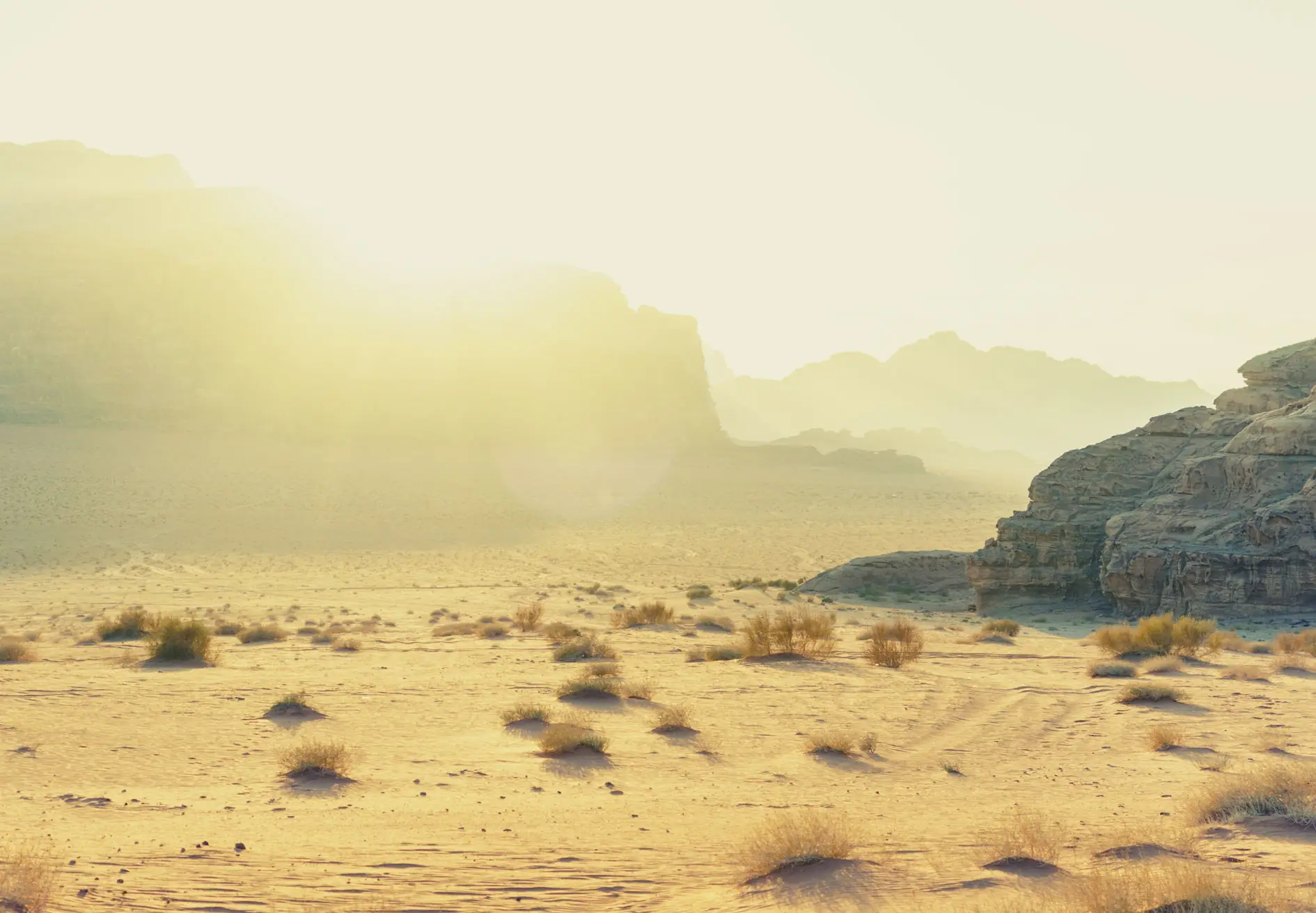 Sunrise over the desert dunes and mountains of Wadi Rum, Jordan